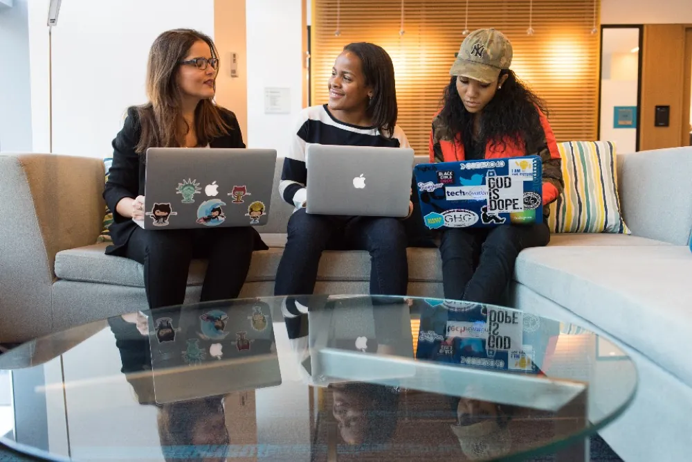 Colleagues working on laptops